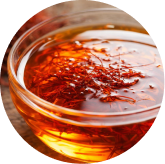 Seller ingredient illustration showing saffron strands in liquid